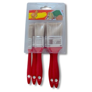 Set di pennelli t.b.t. con manici rossi in confezione.