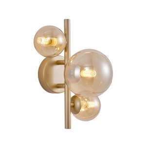 Applique t.b.t. dorata con quattro paralumi in vetro ambrato rotondi.