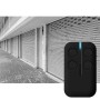Telecomando nero t.b.t. per automazione garage con quattro pulsanti.