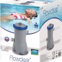 Confezione di un sistema di filtraggio a cartuccia Flowclear per piscine, grigio con accenti blu.