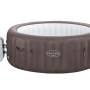 Vasca idromassaggio gonfiabile Lay-Z-Spa marrone con pompa per momenti di relax in giardino.