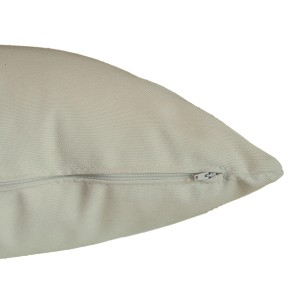 Dettaglio di un cuscino chiaro con cerniera. Ideale per federe.