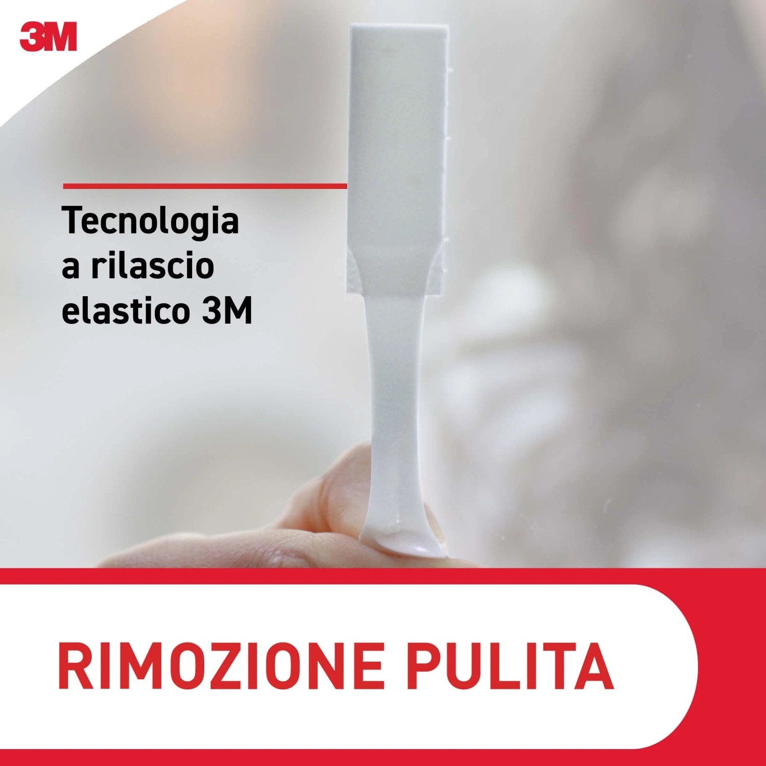 Dettaglio di una striscia adesiva 3M per ganci per quadri. Rimozione facile e senza residui.