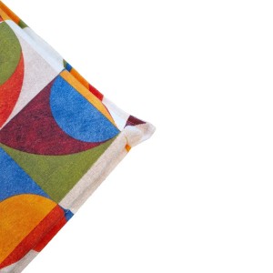 Cuscino decorativo t.b.t. con motivo geometrico multicolore.