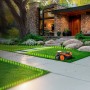 Robot rasaerba Worx M800 Vision senza filo perimetrale in uso in giardino.