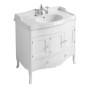 Mobile bagno bianco con lavabo e rubinetto per arredamento bagno.