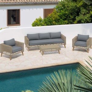 Set di mobili da giardino intrecciati con divano, poltrone e tavolo per patio o giardino.