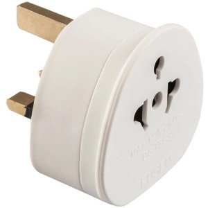 Adattatore da viaggio bianco per diversi tipi di prese.