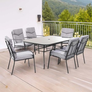 Set di mobili da giardino t.b.t. con tavolo e 6 sedie, cuscini grigi.