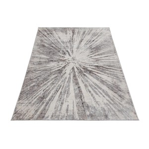 Tappeto moderno con motivo astratto nei toni del grigio e del bianco.