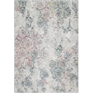 Tappeto moderno con motivo floreale in grigio, blu e rosso.