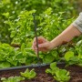 Tubo di prolunga Gardena da 20 cm per ugelli a spruzzo in uso nell'orto.