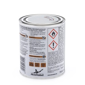 Barattolo di smalto colorato t.b.t. per metallo, con istruzioni per l'uso e simboli di avvertenza stampati.