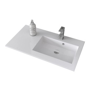 Lavabo singolo t.b.t. bianco con rubinetto e dispenser di sapone.