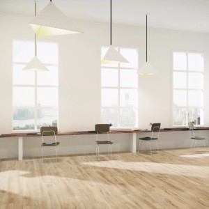 Stanza luminosa con pavimento in legno e sedute alla finestra. Piastrelle per pavimenti effetto legno.