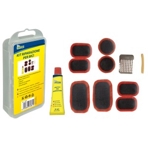Kit riparazione bici con toppe, colla e attrezzi per la riparazione pneumatici.