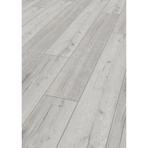 Pavimento laminato chiaro effetto legno per interni.