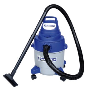 Aspiratutto Michelin blu e grigio per liquidi e solidi con tubo e bocchetta.