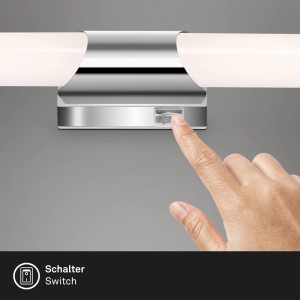 Applique LED t.b.t. con dito sull'interruttore.