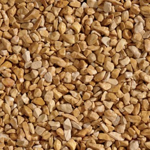 Primo piano di ghiaia decorativa t.b.t., ideale per vialetti e decorazioni da giardino.