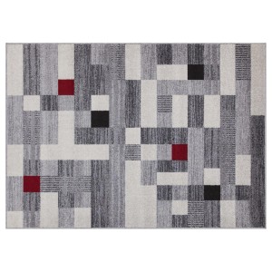 Tappeto moderno con motivo geometrico in grigio, bianco, rosso e nero.