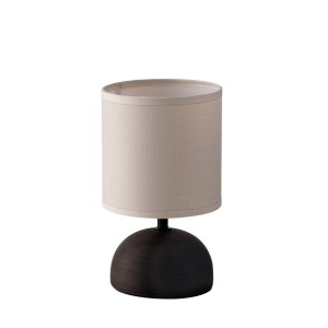 Lampada da tavolo con paralume beige e base scura a forma di emisfero. Lampada di design.