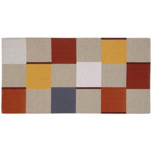 Tappeto moderno con motivo geometrico in beige, giallo, rosso e grigio.
