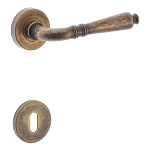 Set maniglia per porta in bronzo per interni.