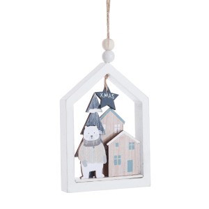 Decorazione natalizia con orso, abete e case in cornice bianca come ornamento per l'albero di Natale.