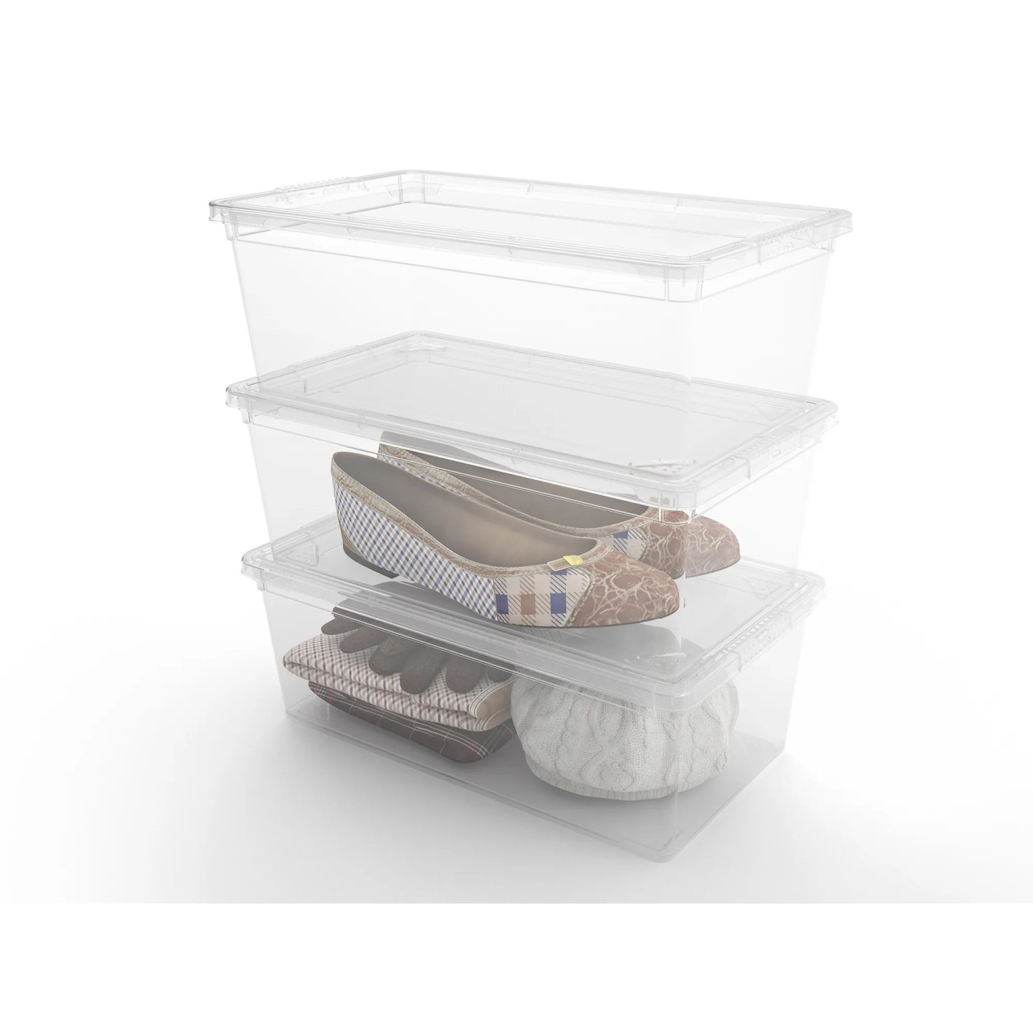 Scatole KIS C XS trasparenti impilate con coperchi, riempite con scarpe e tessuti.