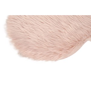 Dettaglio di un tappeto a pelo lungo t.b.t. rosa.