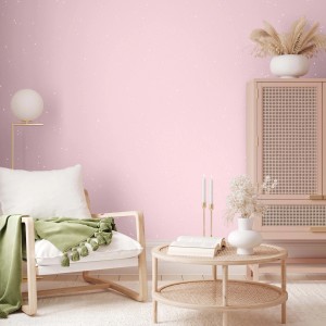 Parete rosa con effetto glitter, parte di una scena di soggiorno. Pittura decorativa.