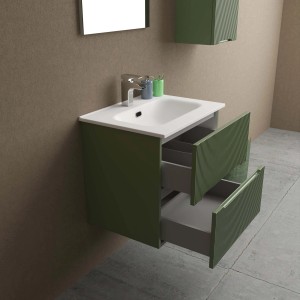 Mobile bagno t.b.t. verde con due cassetti aperti nel bagno.