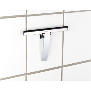 Wenko tergivetro bagno Gela in acciaio inox su piastrelle bianche.