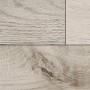 Pavimento laminato Excellent Farco Urban Oak, effetto legno chiaro con struttura percepibile.