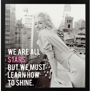 Quadri: Immagine in bianco e nero di Marilyn Monroe con citazione in cornice nera.