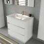 Mobile bagno bianco con tre cassetti e lavabo da appoggio. Arredo bagno.