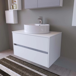 Mobile bagno bianco t.b.t. con lavabo d'appoggio in bagno moderno.