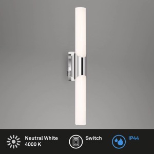 Applique LED moderna con elementi cromati e luce bianca neutra.