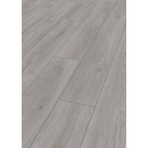 Pavimento in laminato chiaro effetto legno, posato a listoni classici.