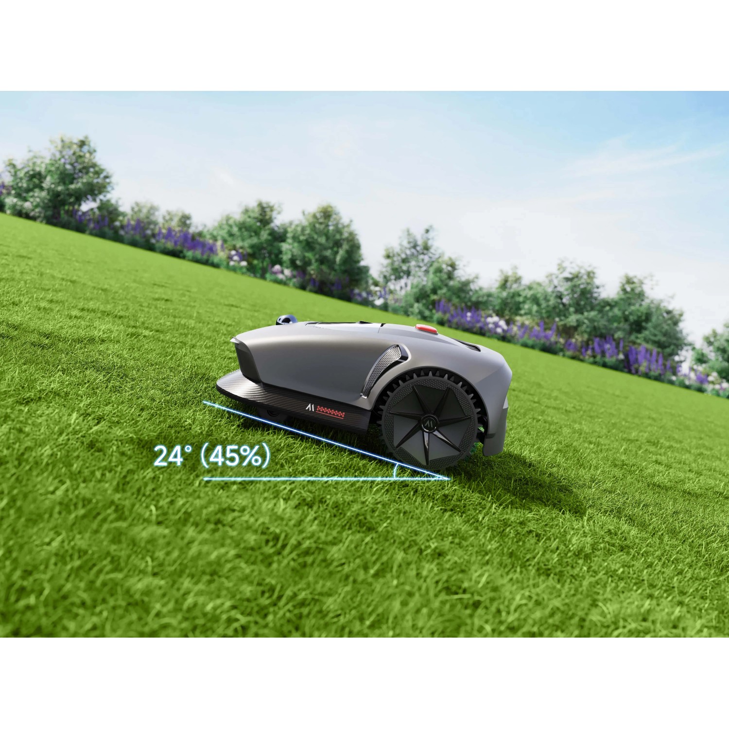 Robot tagliaerba t.b.t. grigio su prato in pendenza. Ideale per giardini collinari.