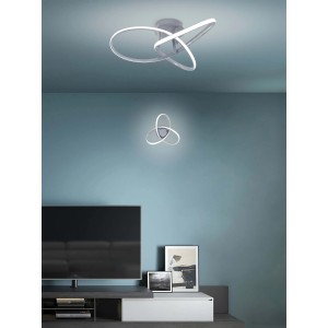 Applique LED moderna con design curvo per un'illuminazione elegante.