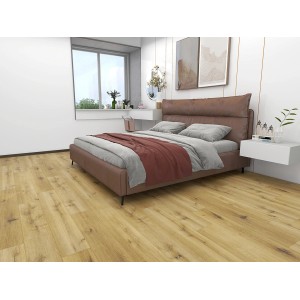 Pavimento vinilico t.b.t. effetto legno installato in camera da letto.