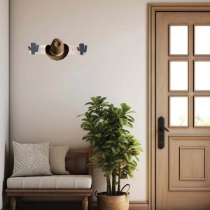 Appendiabiti da parete con motivo cactus e cappello, parte di un sistema organizer.