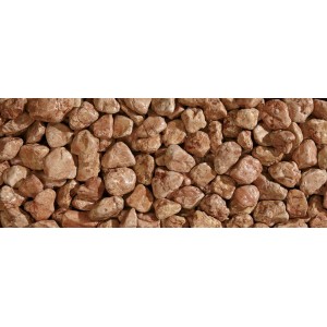 Primo piano di ciottoli/granulato decorativo t.b.t. in tonalità rossastre.