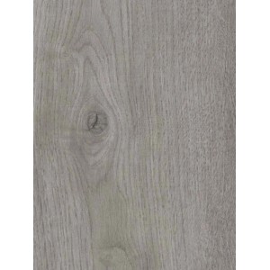 Dettaglio di un pavimento vinilico effetto legno. Resistente e facile da pulire.