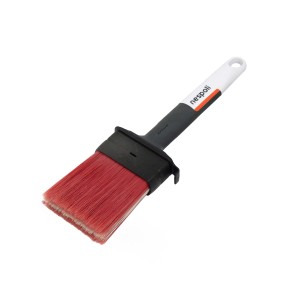 Pennello t.b.t. con setole rosse e manico grigio-bianco.