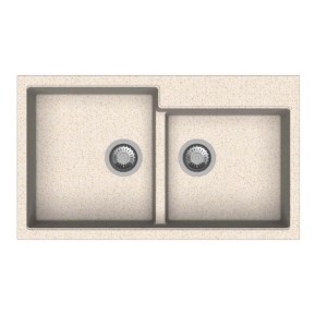 Lavello beige con due vasche e scarico in acciaio inox.