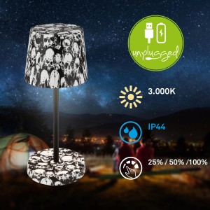 Lampada da tavolo a batteria Brilo Piha con motivo teschio, dimmer touch e protezione IP44.