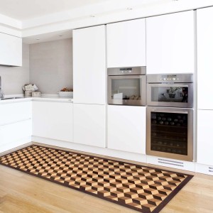 Tappeto cucina t.b.t. con motivo a cubi 3D in marrone e beige davanti a mobili da cucina bianchi.